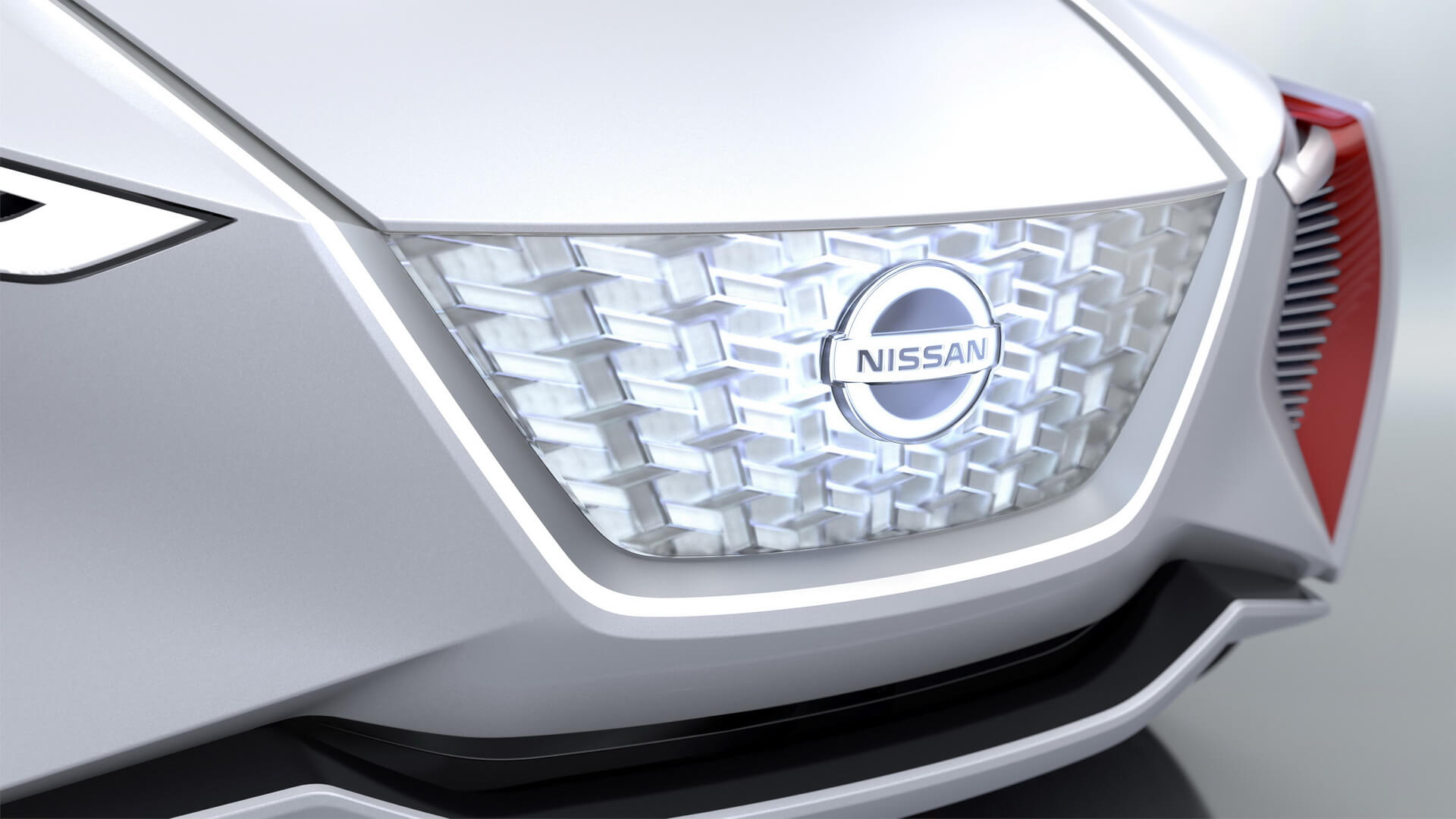 Фирменная решетка V-motion от Nissan Фирменная решетка V-motion от Nissan